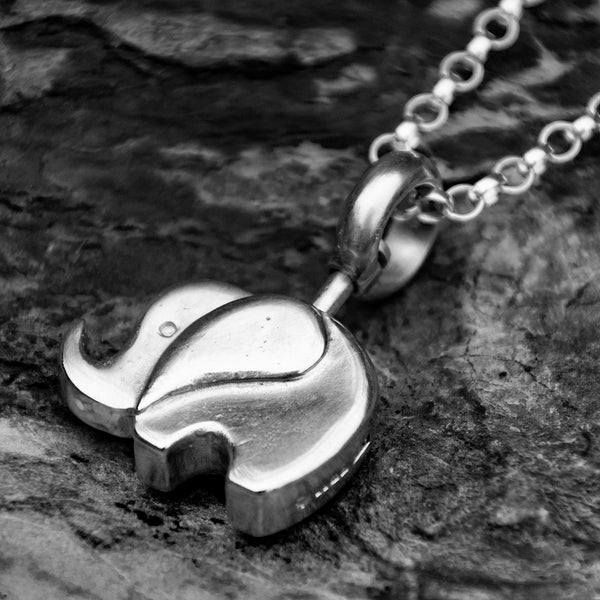 Trunk up elephant pendant