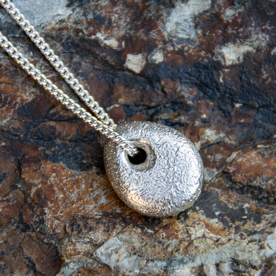 Lucky solid silver pebble pendant
