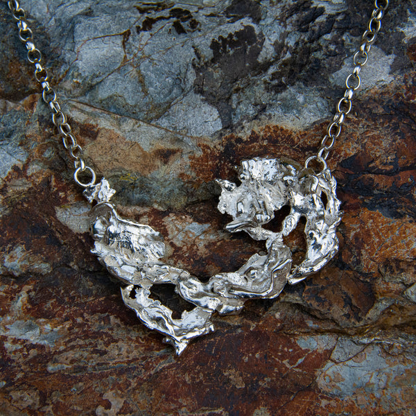 Unique sterling silver necklace reminiscent of seafoam